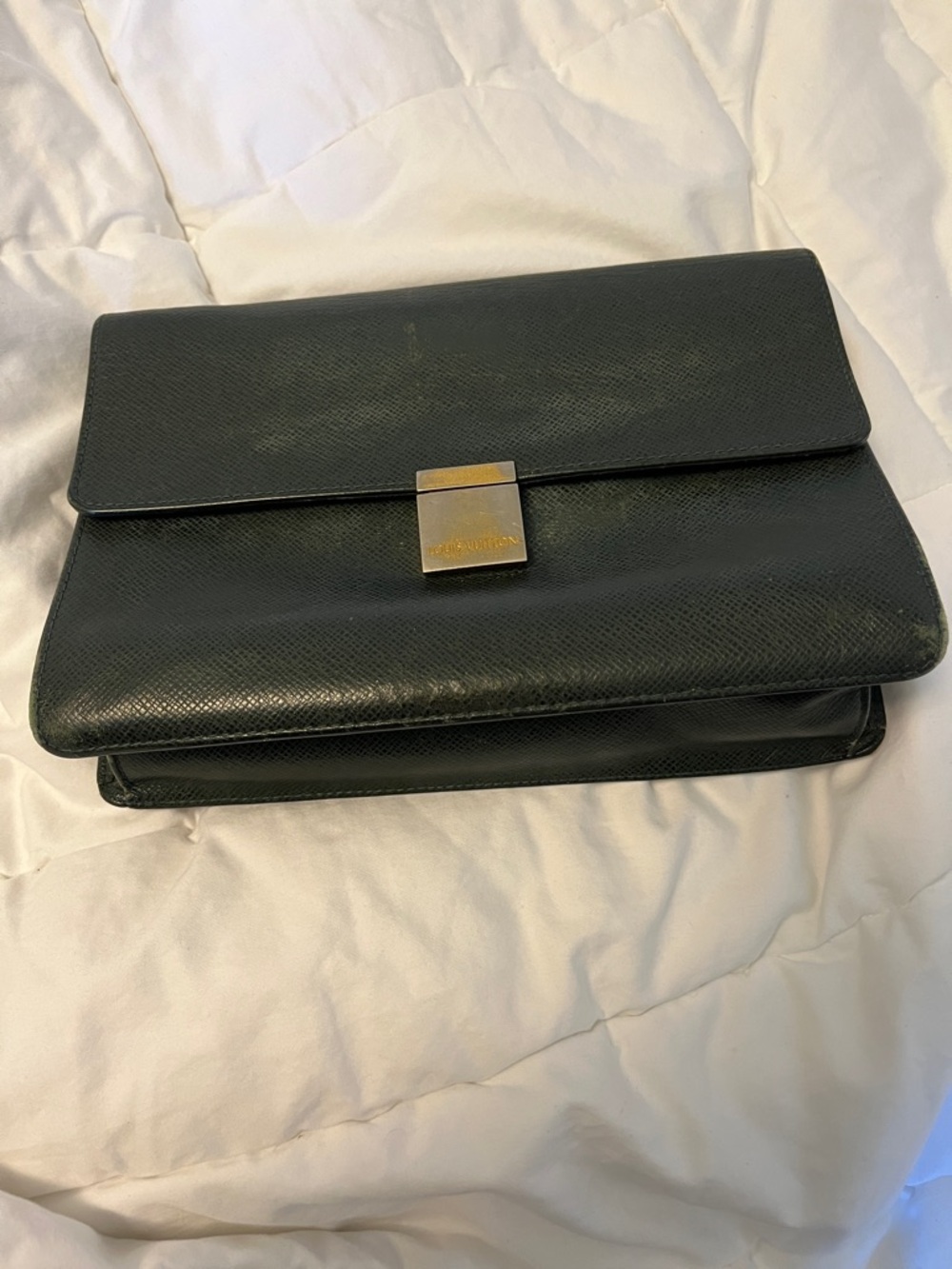 Louis Vuitton Black Leather Briefcase with Gold-Tone Lock
Look at all photos